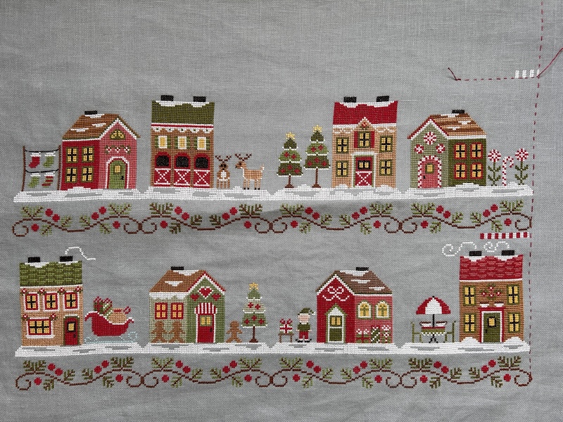 Santa's  Village, een oud patroon van Country Cottage Needleworks